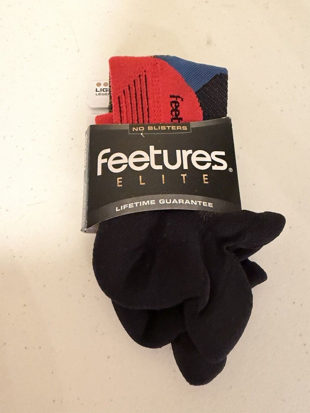 Feetures Elite Light Cushion No Show Tab Socks L 9-12 Bounce Black NWT